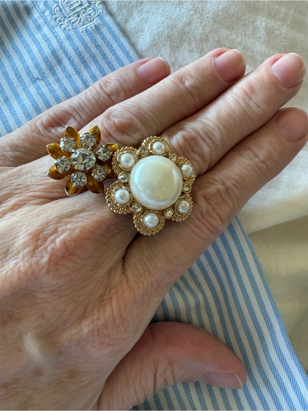 Set of two rings made from vintage clip earrings. Size adjustable.